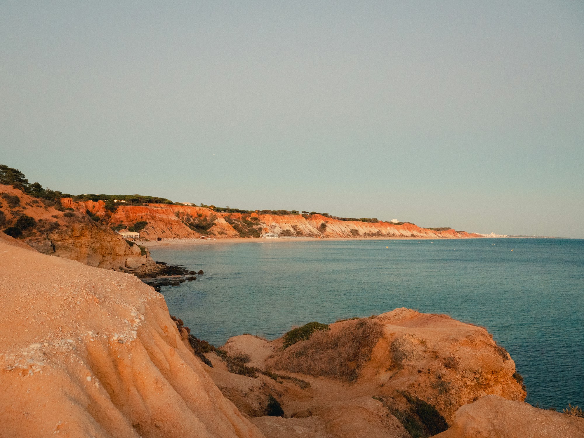 Ochre cliffs meeting the Atlantic on the Algarve coast